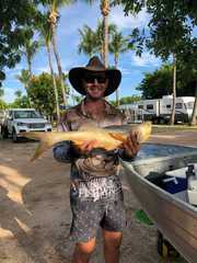 Ollie is having lunch at Karumba Point Sunset Caravan Park. Nice catch